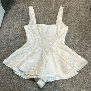 Lulu’s White Embroidered Romper Size Small. It’s been worn twice!